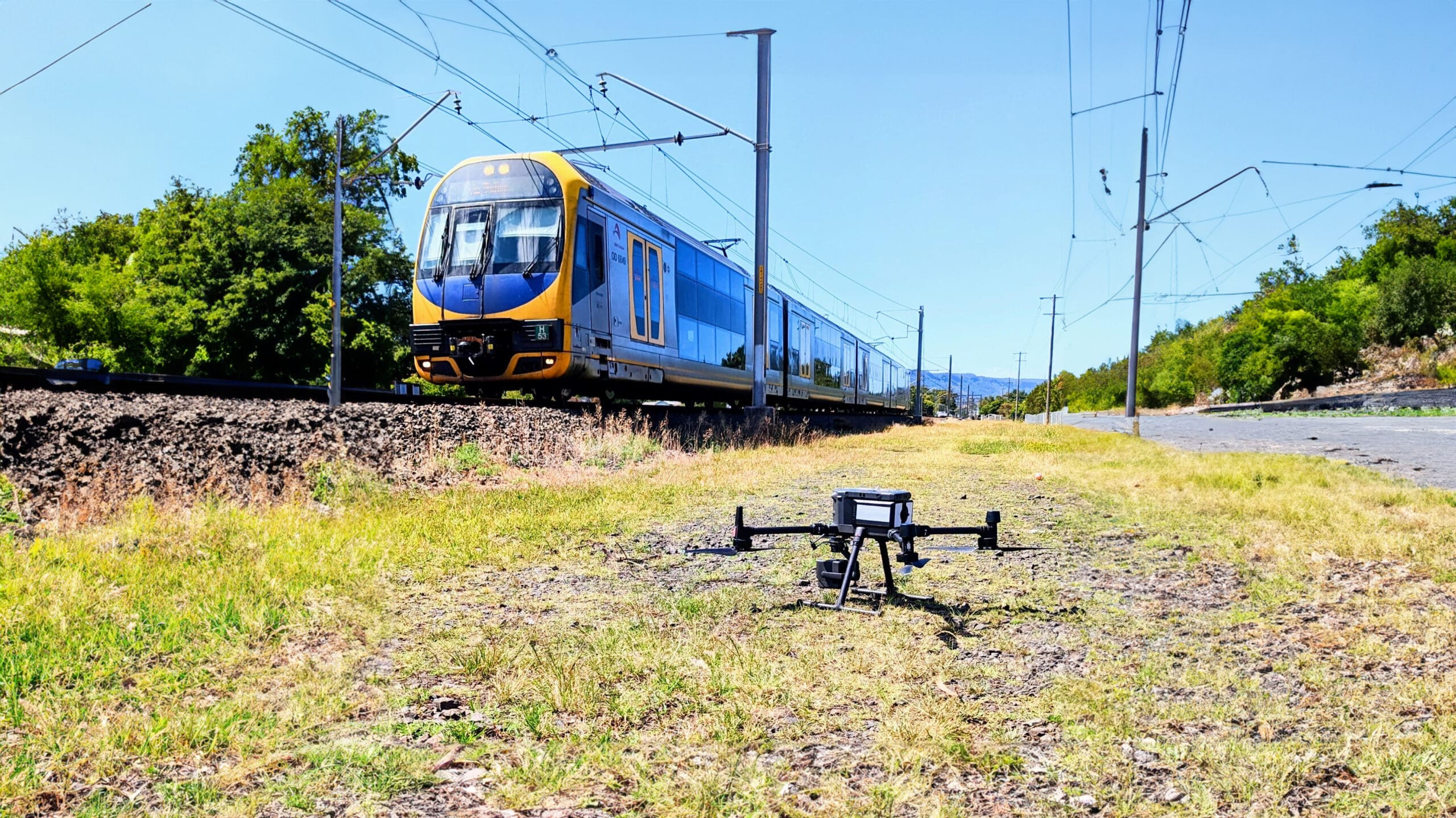 Train and survey drone on a rail corridor